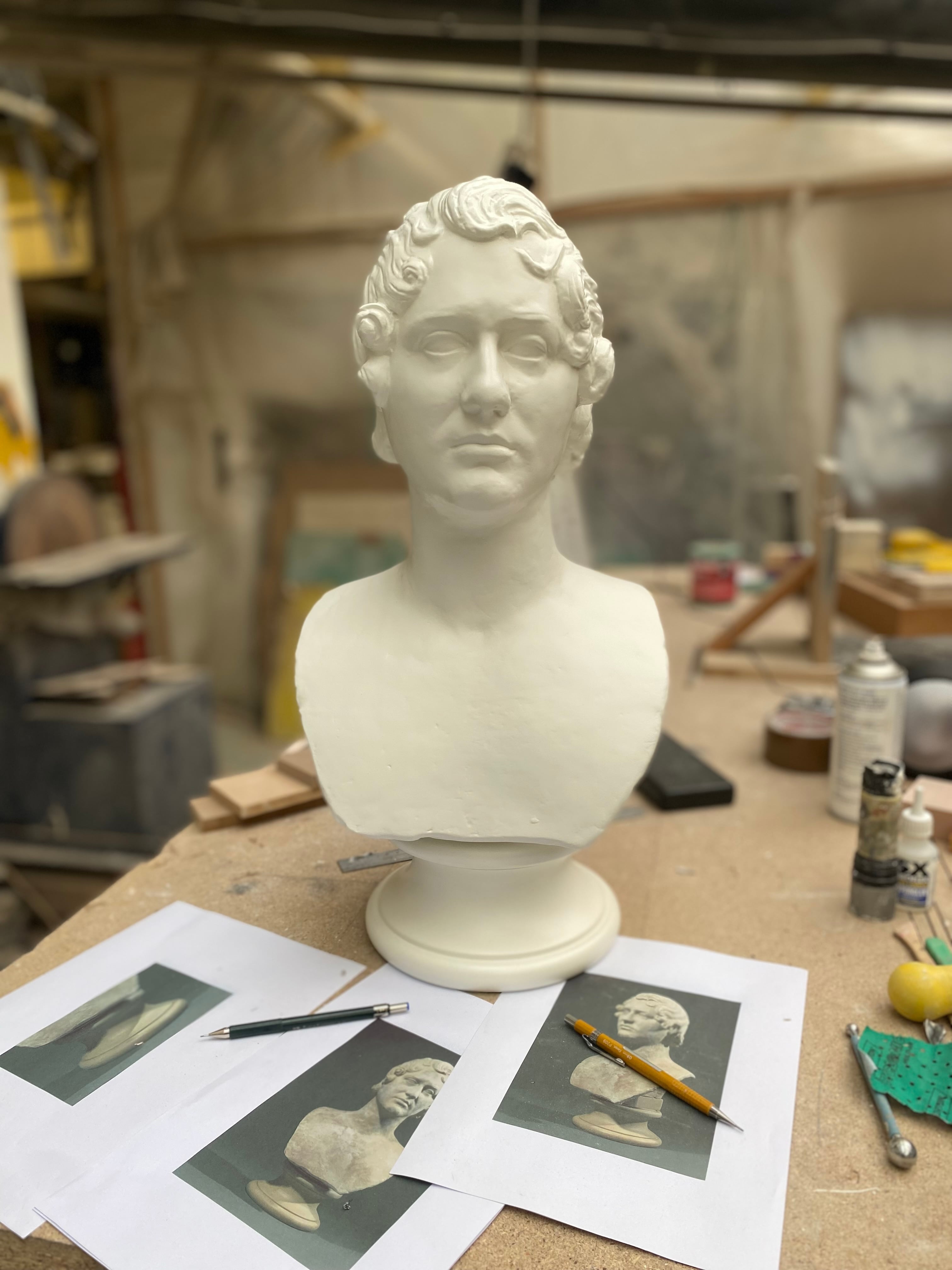 3D printed classical bust in workshop with reference photos